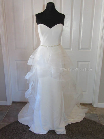 100% Authentic Enzoani Janessa Wedding Dress with a detachable over skirt. 