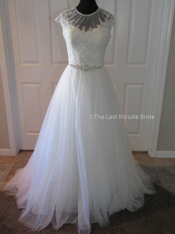 100% Authentic Madison James MJ167 wedding dress from The Last Minute Bride.